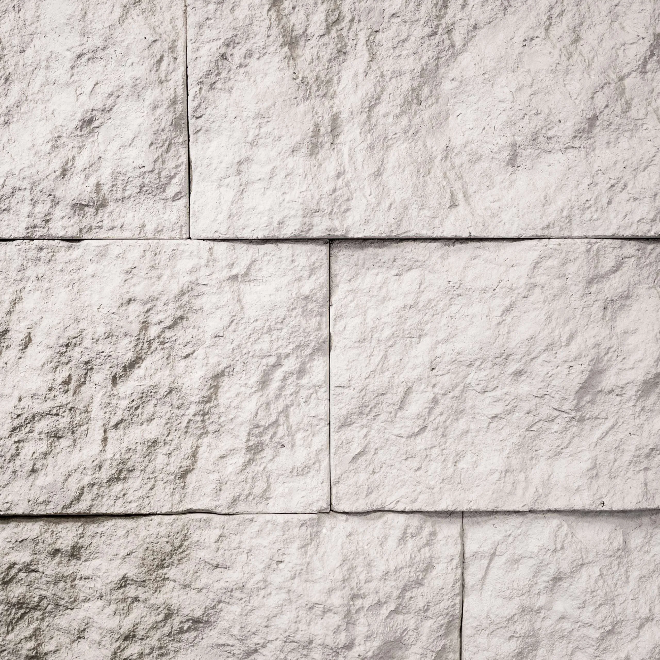 Evolve Stone mortarless veneer siding monument gate winter valley